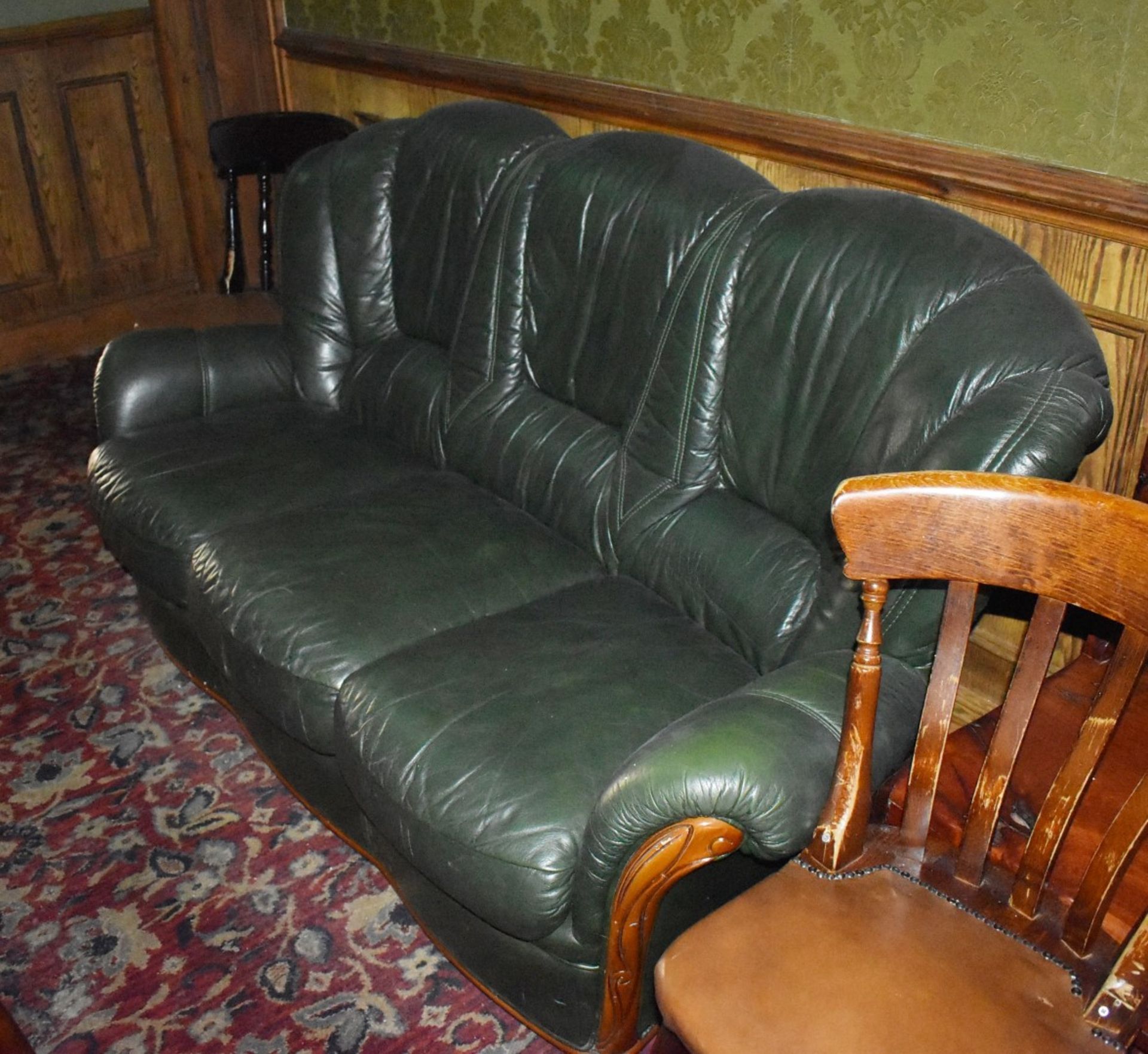 1 x Sofa - Green Leather With Wood Detail - CL586 - Location: Stockport SK1 This item is to be