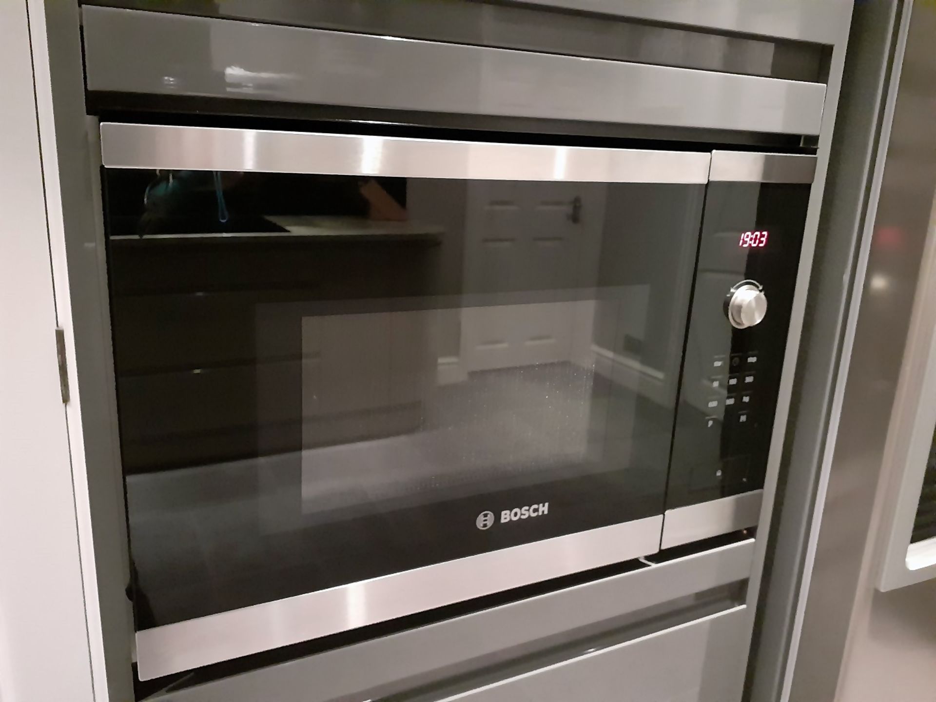 1 x Fitted Kitchen With A Sleek Handleless Design, Integrated Bosch Appliances + Granite Worktops - Image 51 of 69