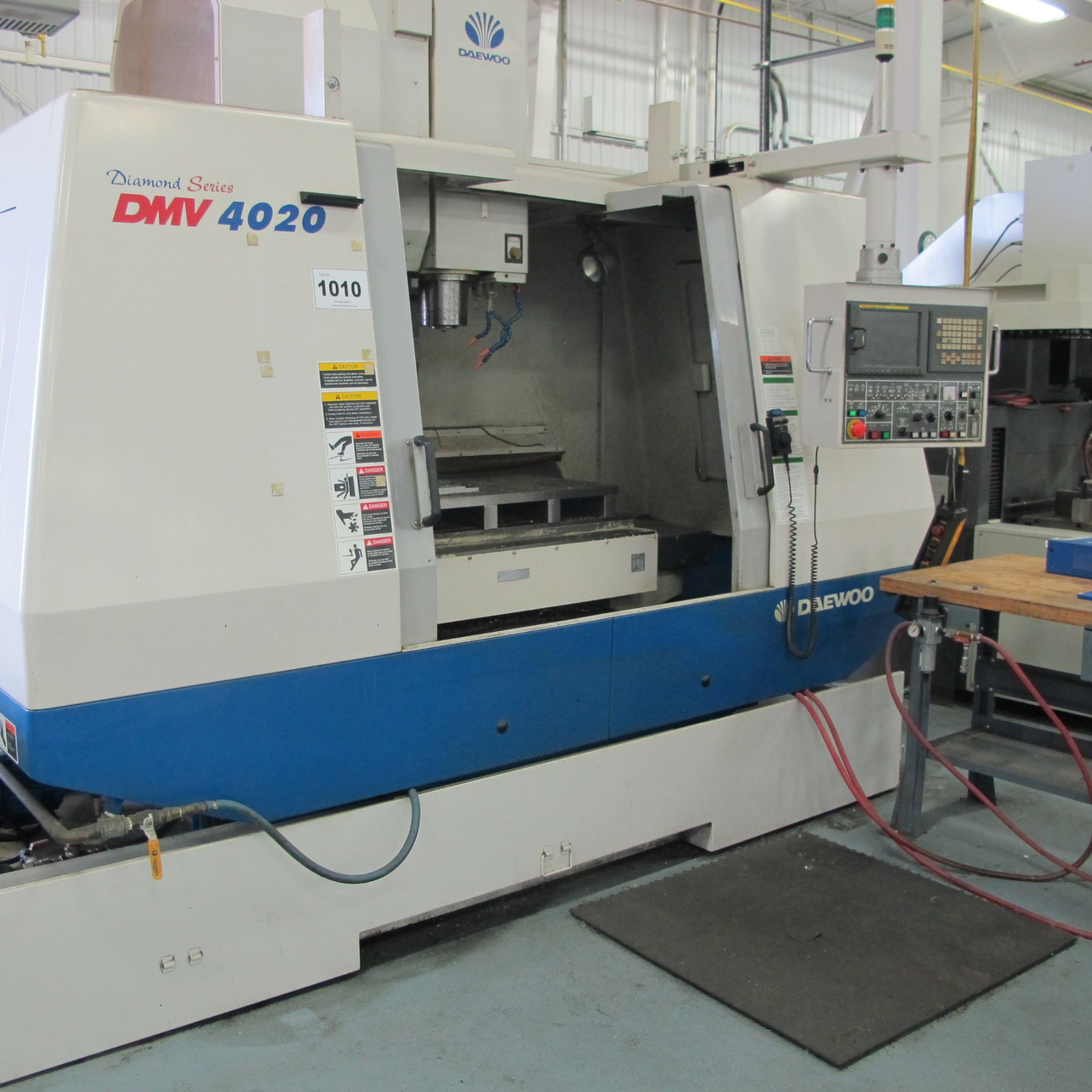 2002 DAEWOO DMV-4020 CNC VERTICAL MACHINING CENTER, FANUC SERIES 21i-M CNC CONTROL S/N: AV5E1238, - Image 7 of 7