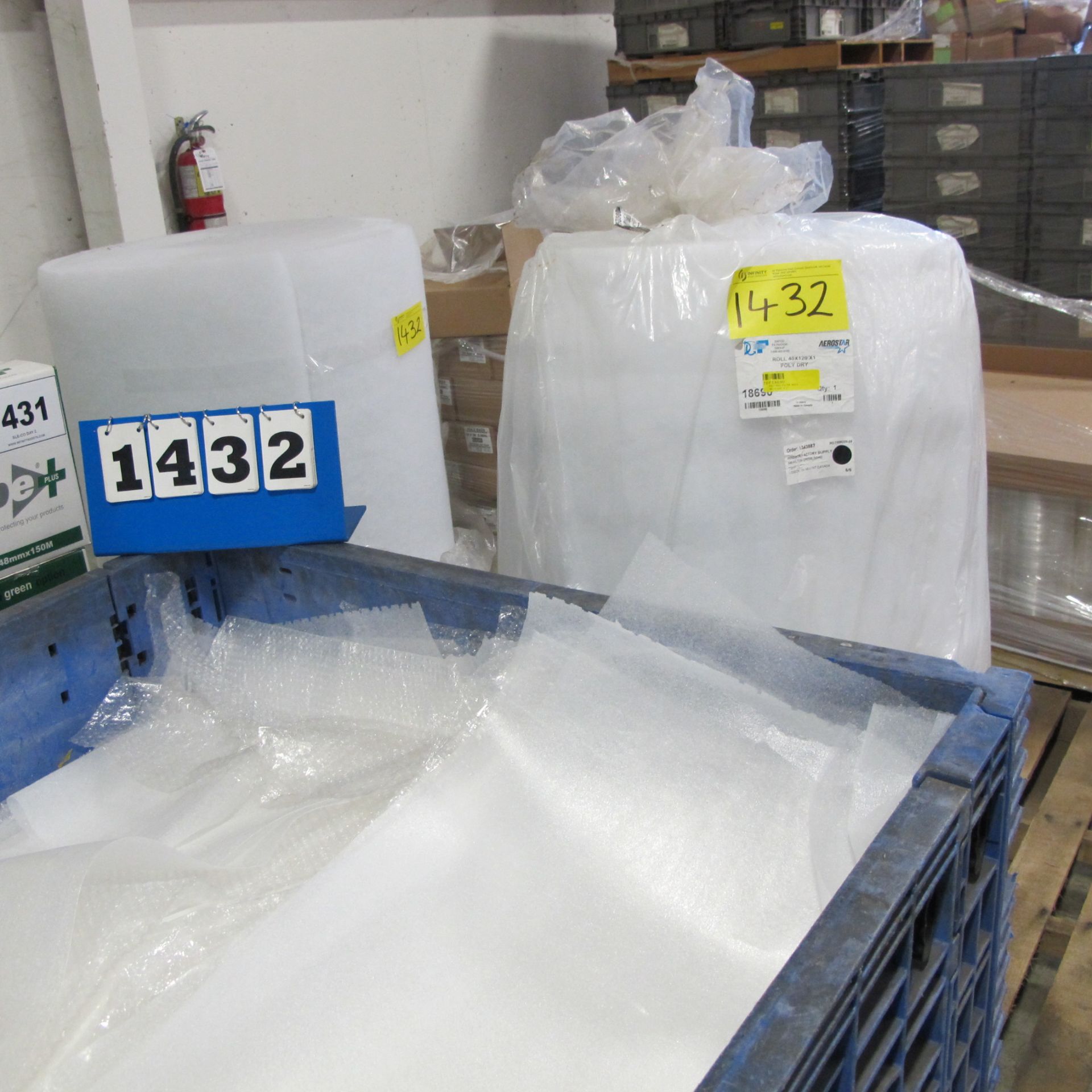 2 PALLETS OF FILTERS (2 ROLLS) AND PLASTIC TOTE OF WRAPPING MATERIAL