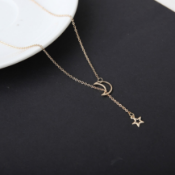 BRAND NEW LADIES GOLD TONE, STAR AND MOON NECKLACE (42)