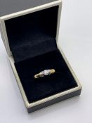 18CT YELLOW GOLD WITH WHITE GOLD TOP, SET WITH SINGLE SOLITAIRE DIAMOND