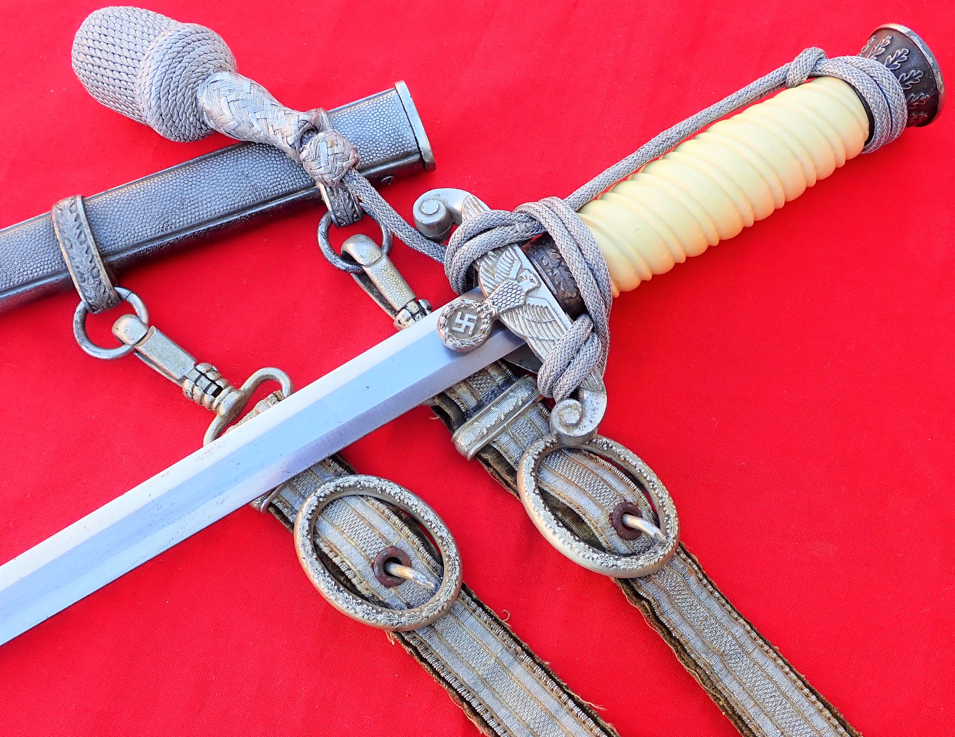 WW2 Nazi Germany Army officer’s dagger, scabbard, knot and hangers.