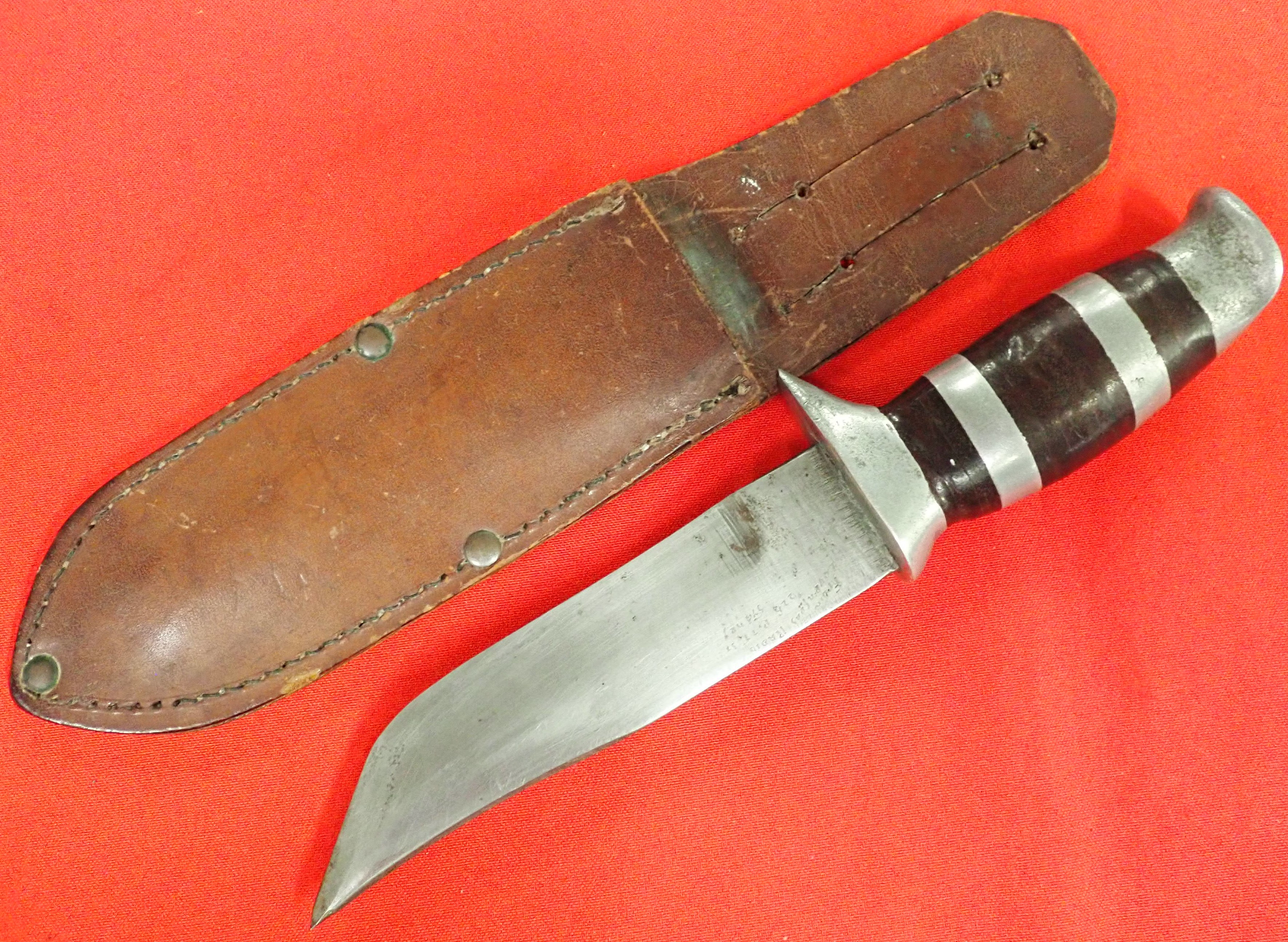 WW2 Australian fighting knife & scabbard, being originally gifted by Levenson Radio, Sydney.