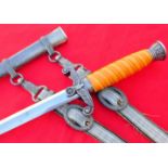 WW2 German Army officer’s dagger & scabbard by Carl Eickhorn with hangers.