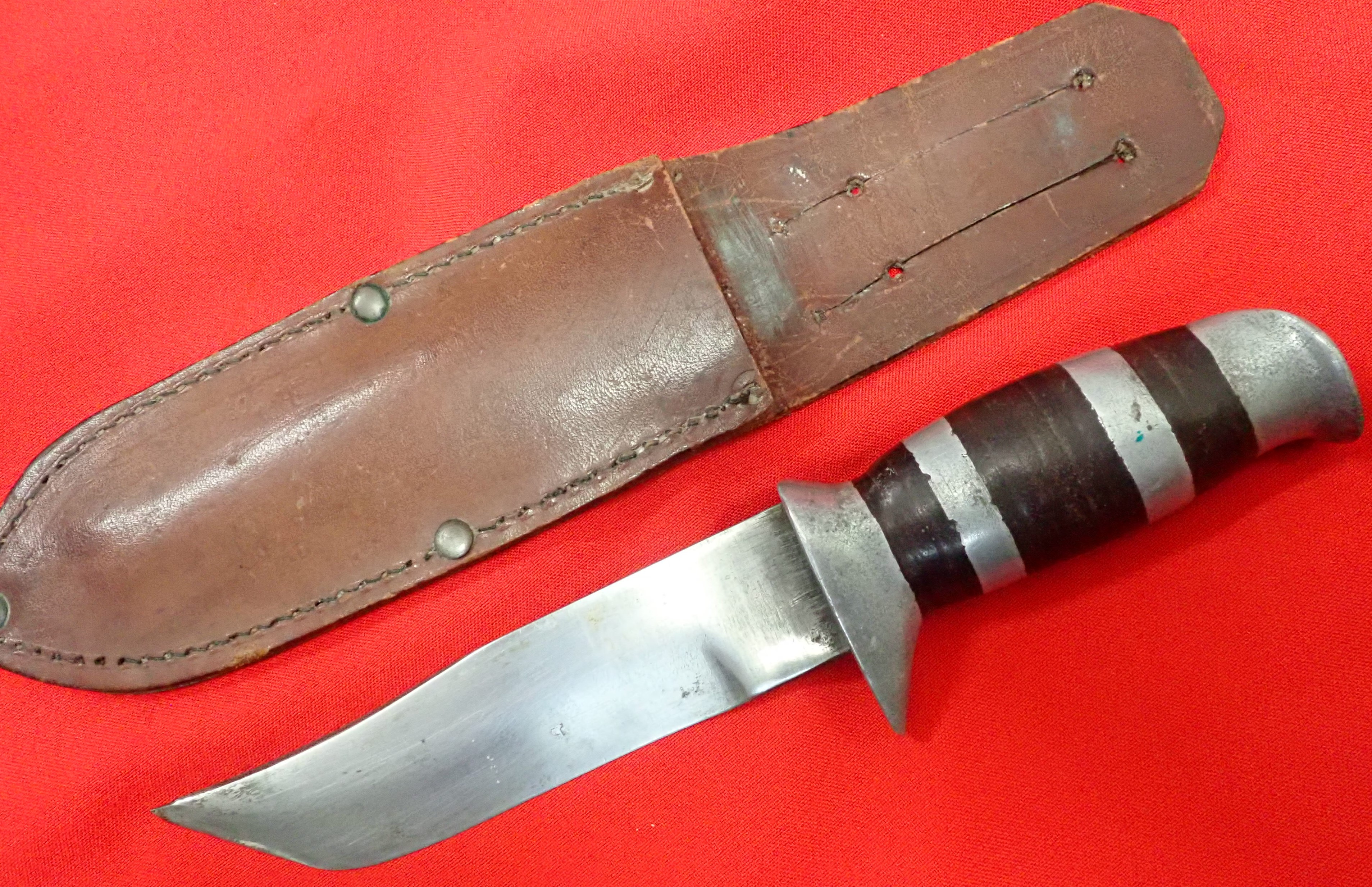 WW2 Australian fighting knife & scabbard, being originally gifted by Levenson Radio, Sydney. - Image 9 of 11