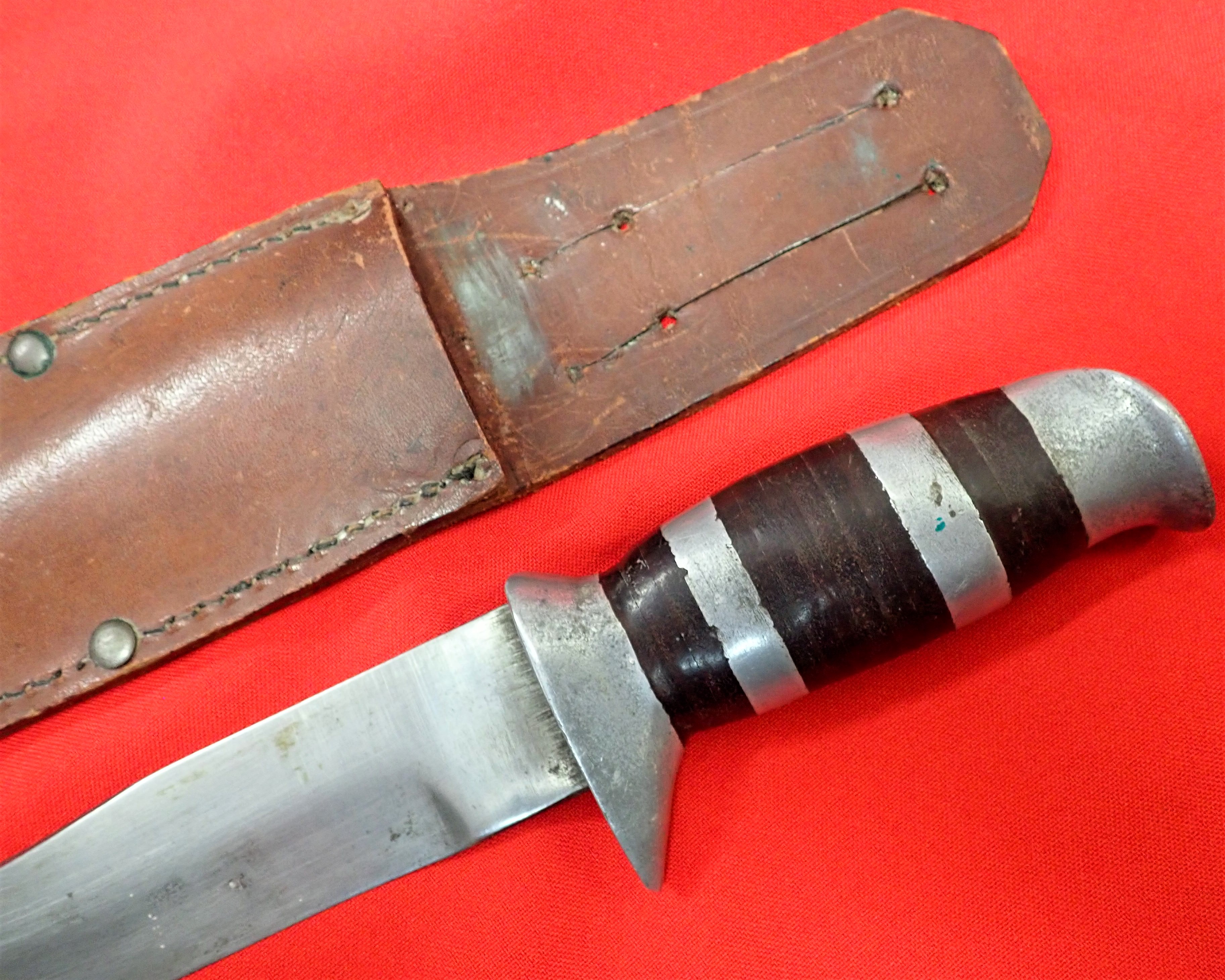 WW2 Australian fighting knife & scabbard, being originally gifted by Levenson Radio, Sydney. - Image 10 of 11