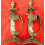 WW1 Imperial German Navy ‘degen’ lion's head sword hilt candlesticks (2).