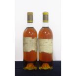 v 2 bts Ch. d'Yquem 1965 Sauternes 1er Grand Cru Classé ts, sl tears to sl bs/aged label