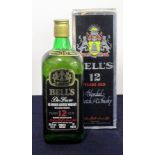 1 x 26 2/3 fl-oz bt Bells 12 YO Whisky