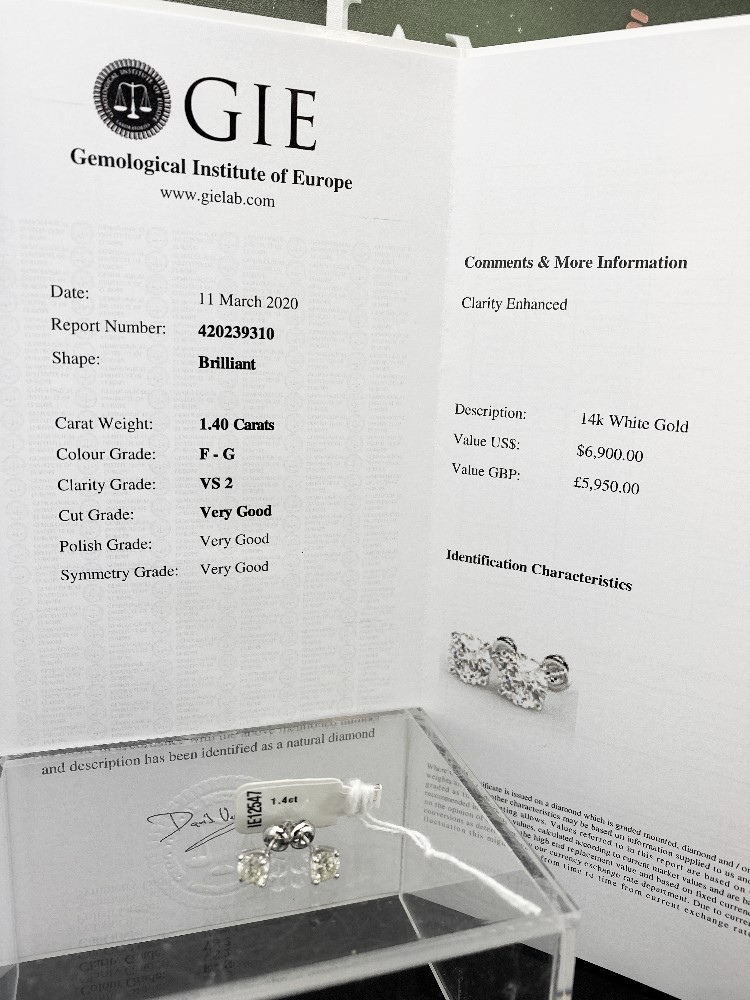 Pair of New 1.40 Carat Round Cut VS2/F Diamond Stud Earrings on 14K White Hallmarked Gold - Image 3 of 5