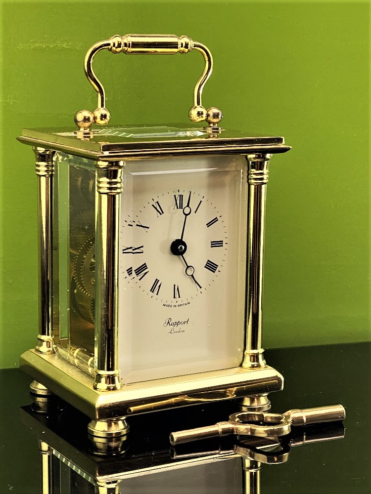 Rapport Of London - Brass Cased Carriage Clock. Cream Roman Numerals Face.