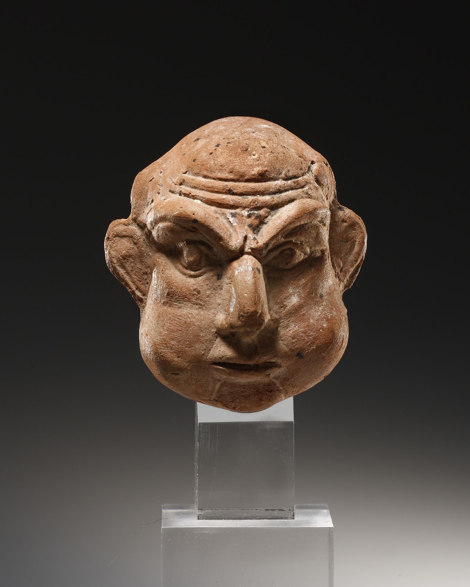 A Grotesque Head of a Bald Man