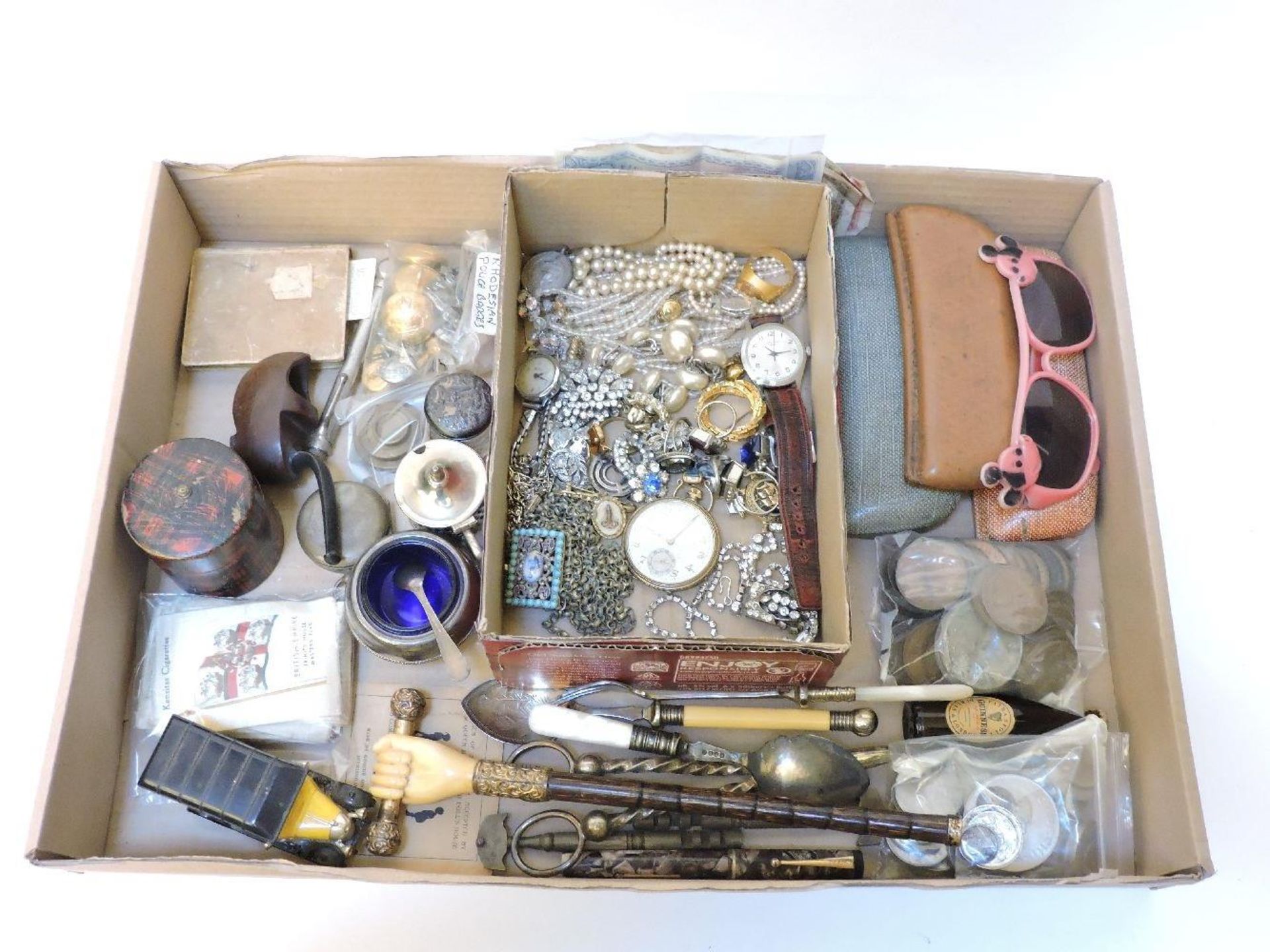 A box of collector's items, to include a parasol handle, four pairs of 1950s glasses, a tartan