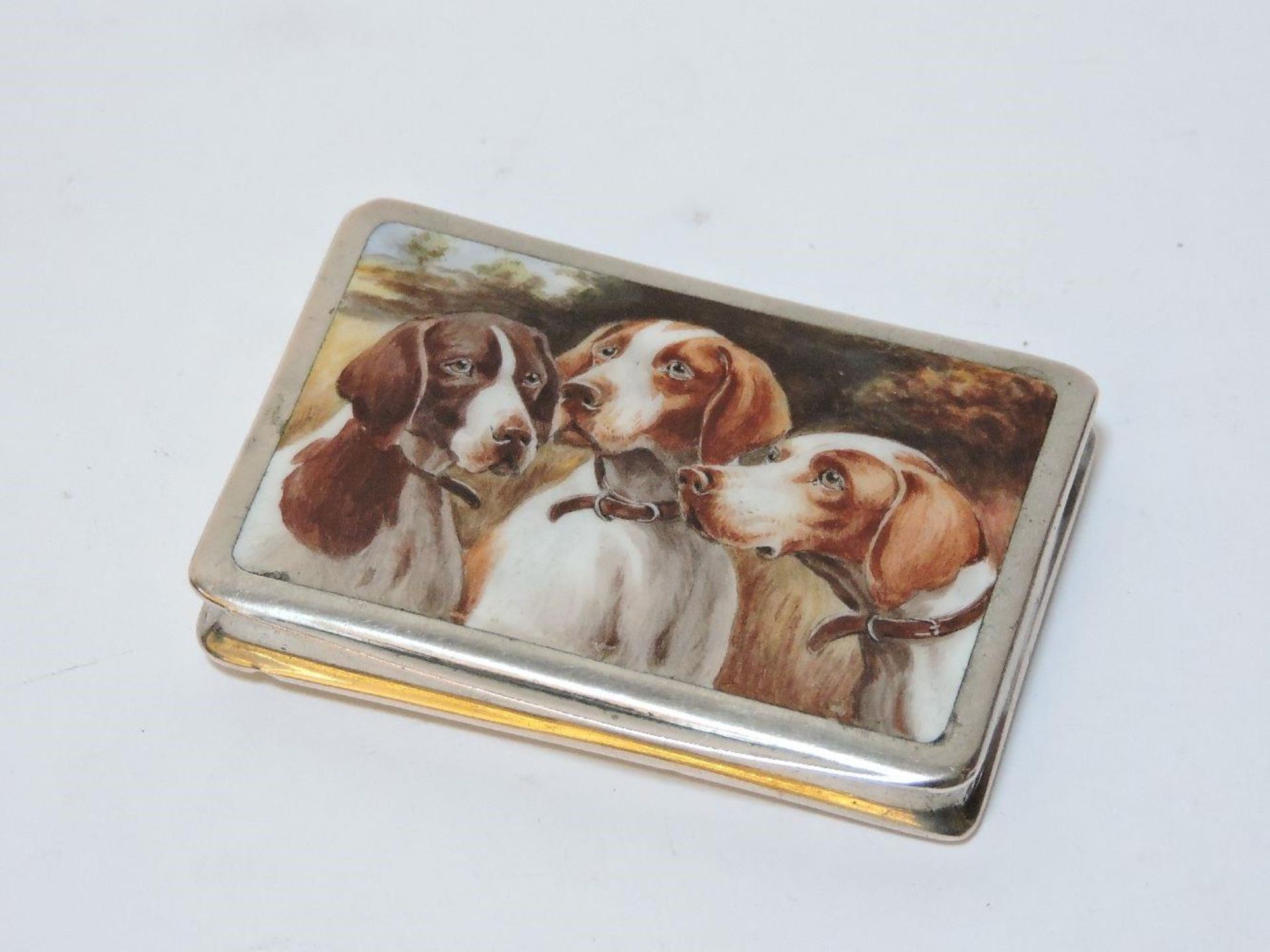 A Continental '800' silver snuff box, of rectangular form, the lid with hand painted enamel panel of