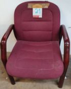 Burgundy fabric chair with wooden arms and legs