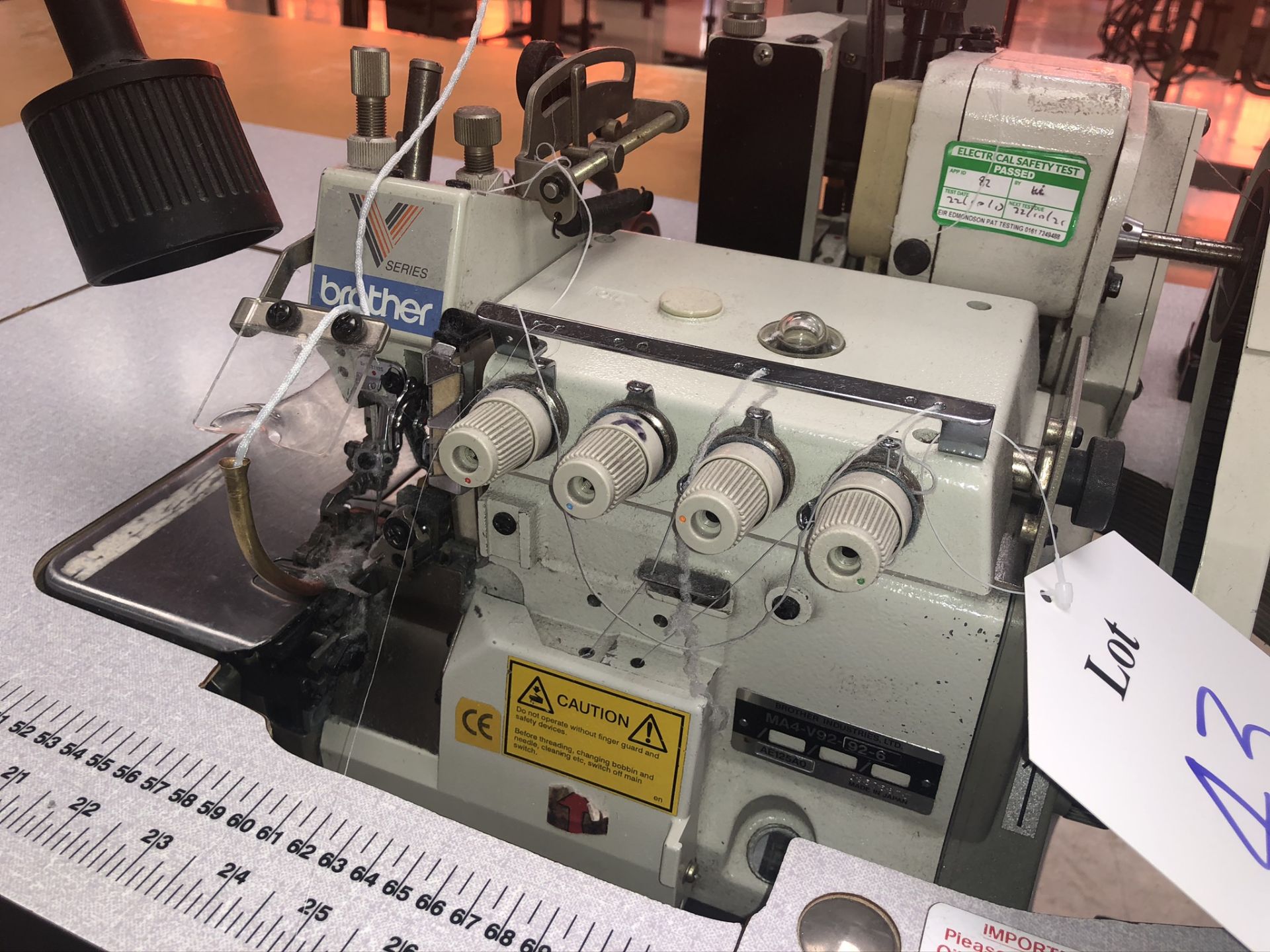 Brother MA4-V92 92-6-3 thread overlock sewing machine w/ Racing TFU16-3 upper tape feeder & PK pulle - Image 6 of 8