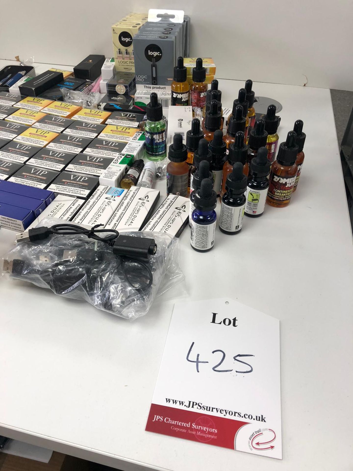 Approximatley 25 x assoreted vape, juices, coil tanks and pods as per attached photos ex display