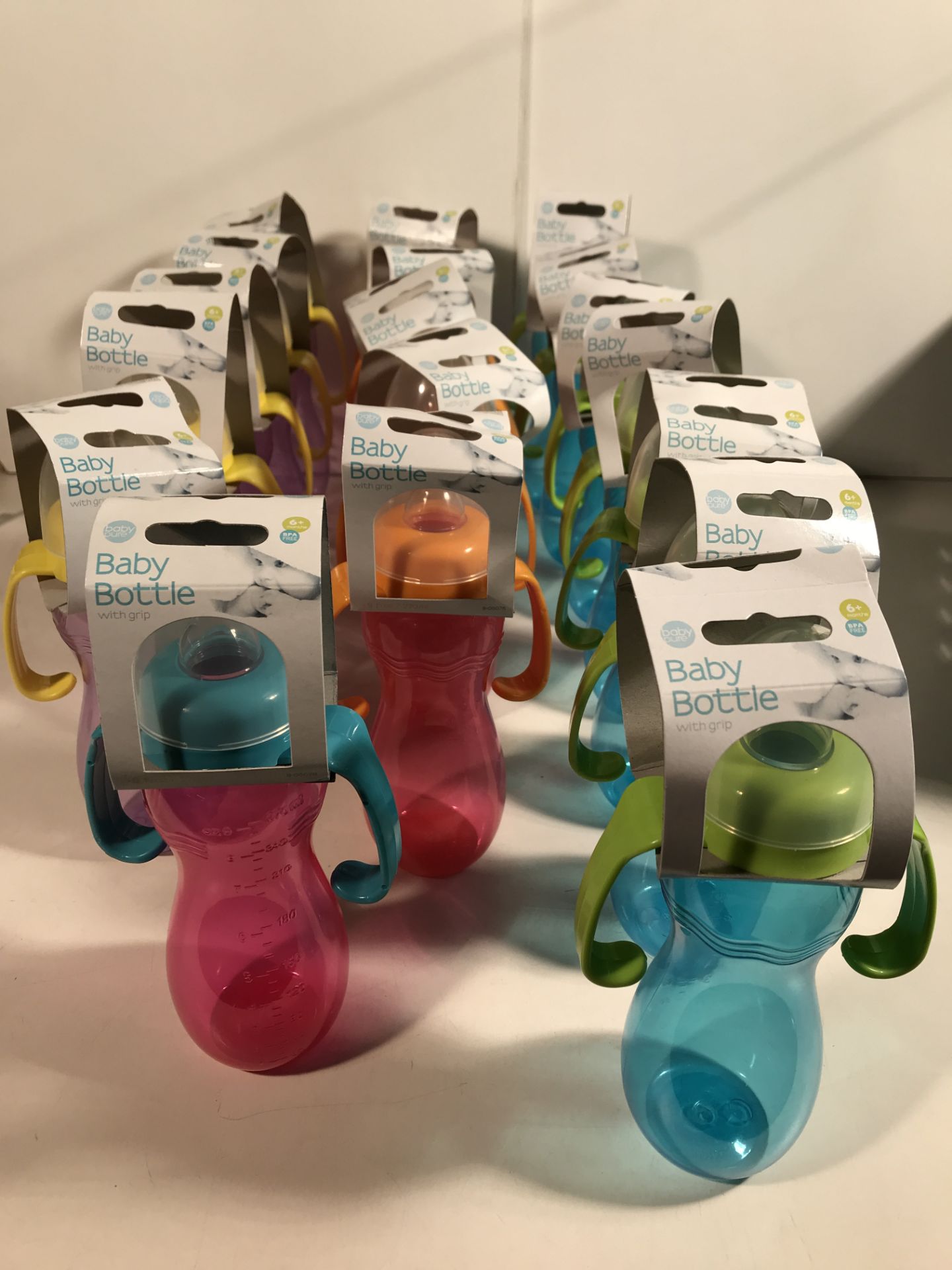 18 x Coloured Baby Bottles With Grips