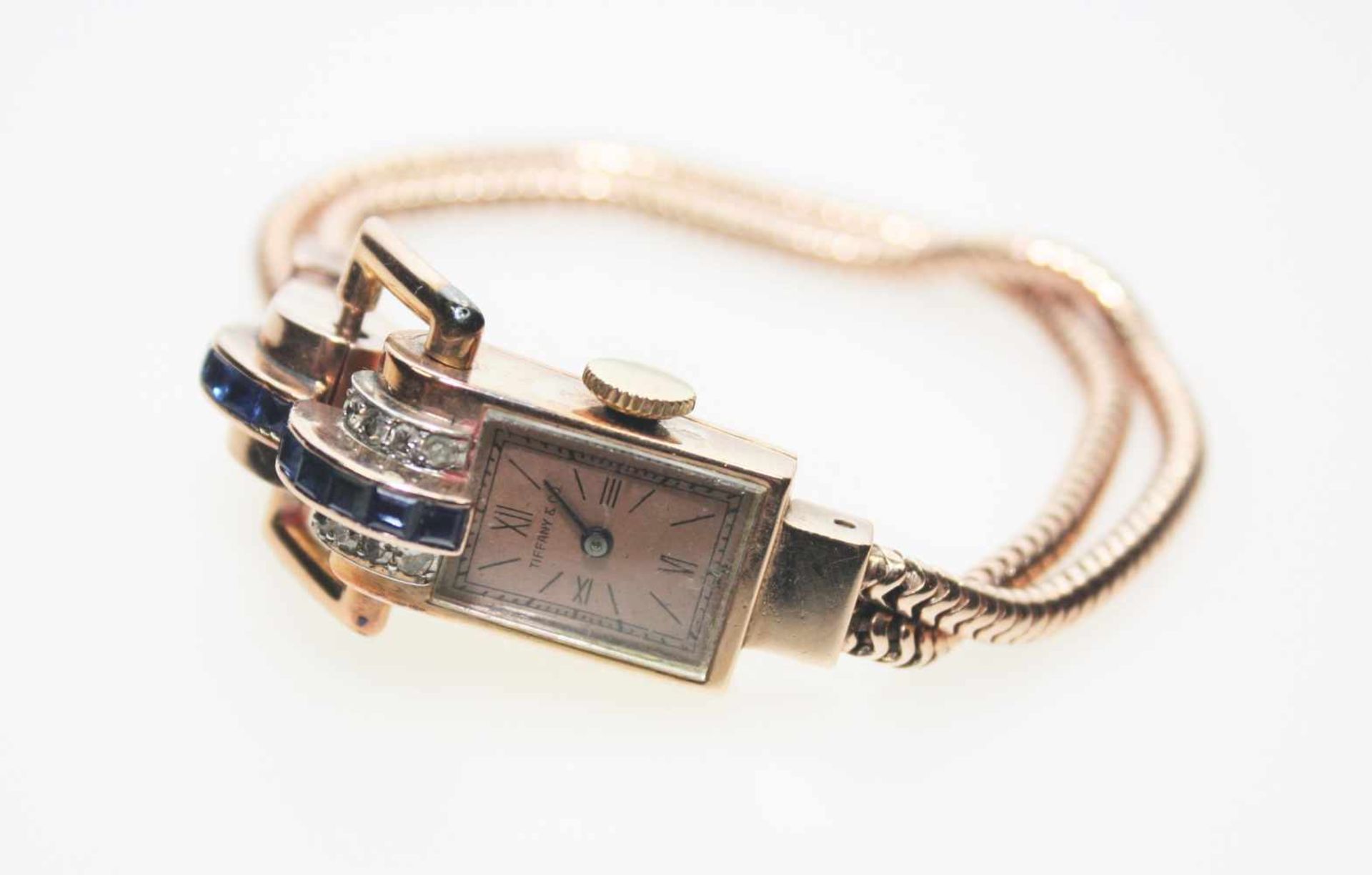 Ältere Damen-Armbanduhr in Rotgold ca. 585/f, rechteckiges Zifferblatt bezeichnet Tiffany & Co.,