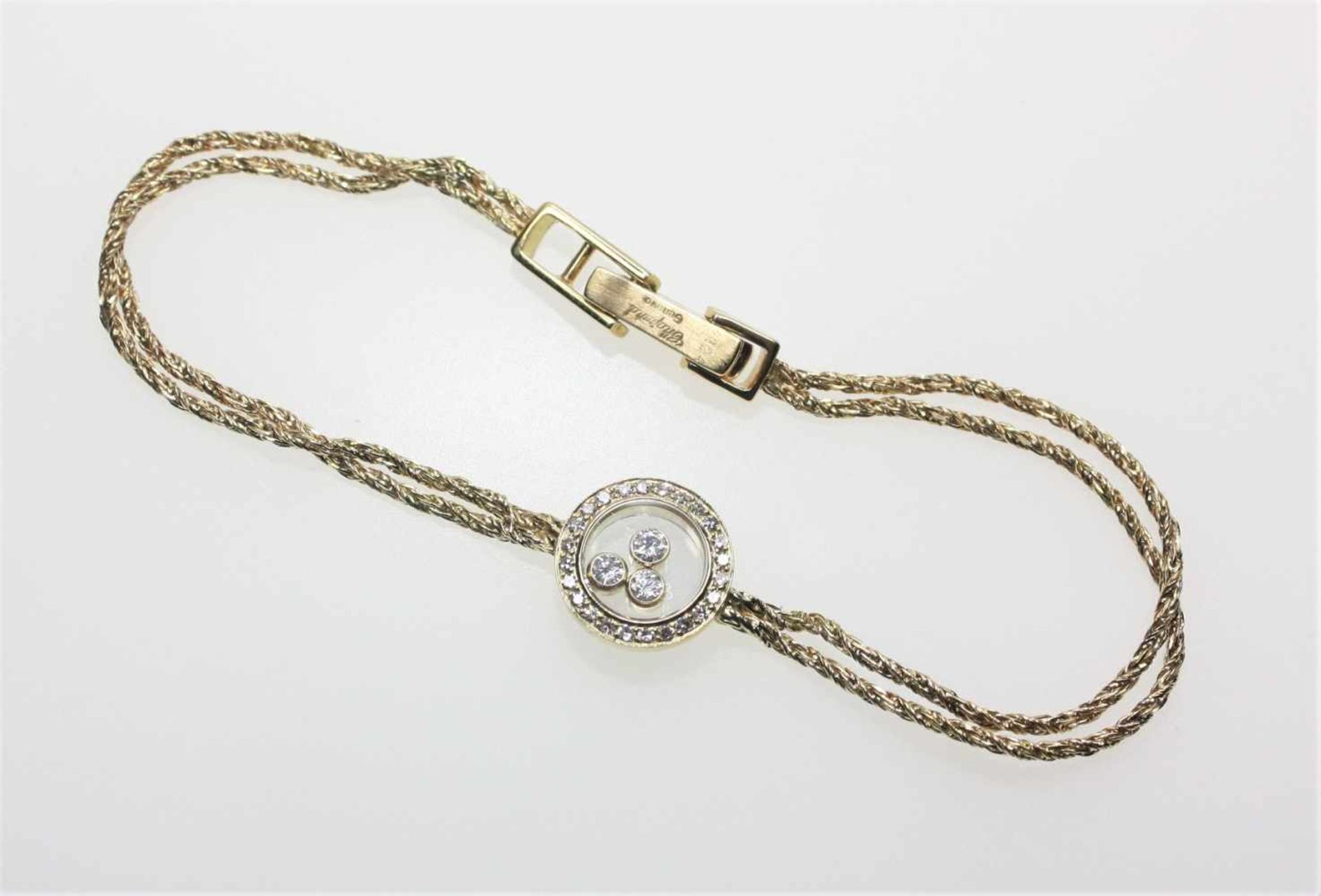 Goldenes Armband 750/f gest. Chopard, Happy Diamond, zwei dünne, gekordelte Stränge mit rundem