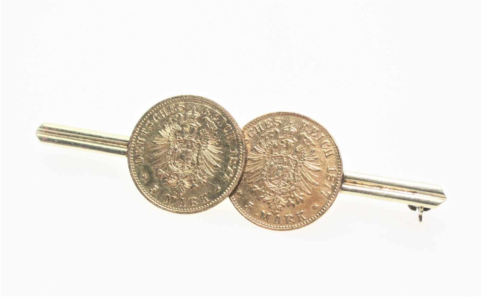 Goldene Stabnadel 585/f gest. mit zwei aufgesetzten Goldmünzen 5 Mark 1877.Brgw. 8,3 g