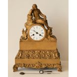 Pendule en bronze et laiton doré : "chasseur caressant un oiseau", cadran émaillé [...]