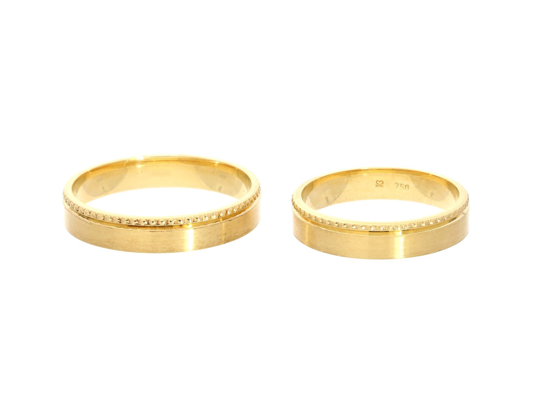 Ringe: feine, ungetragene Trauringe aus 18K Gelbgold