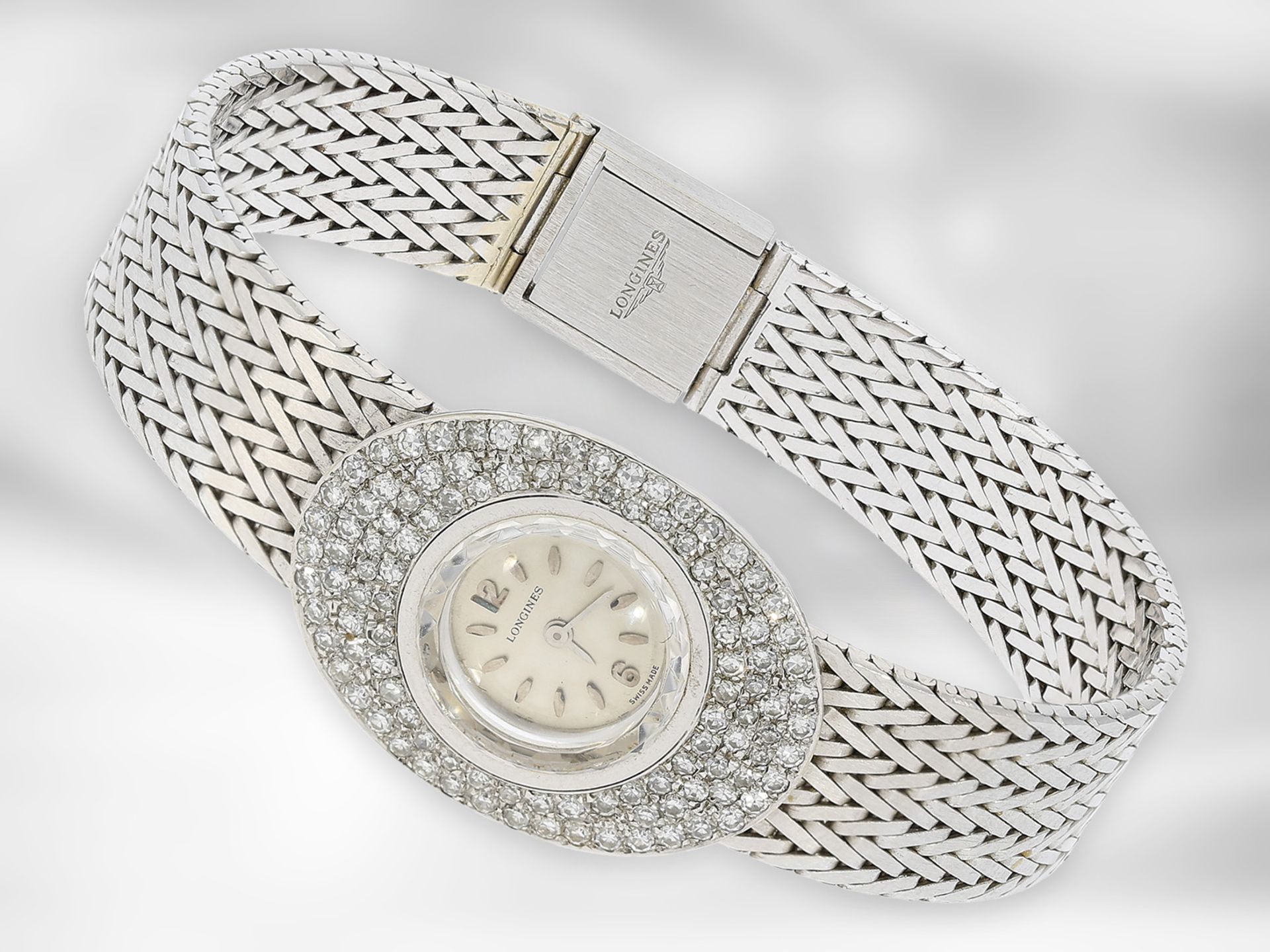 Armbanduhr: edle, weißgoldene vintage Damenuhr von Longines mit Diamantbesatz, ca. 1,2ct, 18K