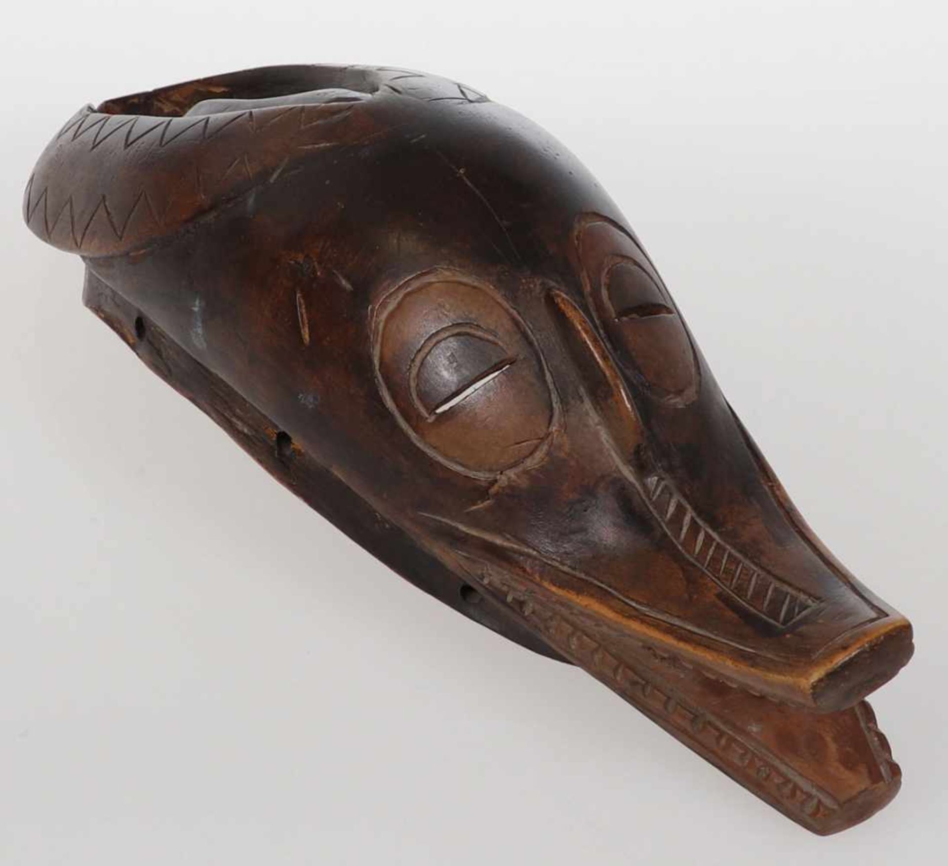 Guro MaskeElfenbeinküste. Holz, geschnitzt. H. 36 cm. Antilopenmaske.- - -22.00 % buyer's premium on