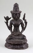 Bodhisattva mit 3 GesichternWohl Tibet, um 1900. Bronze. H. 16 cm. Sitzend auf Lotussockel.- - -22.