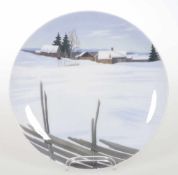 Wandteller Winterlandschaft mit verschneiten Häusern<