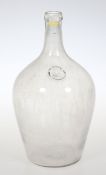 Vorratsflasche mit SiegelFarbloses Glas. Auf dem Siegel bez.: 55 M im Dreieck 5 L. H. 36,5 cm.