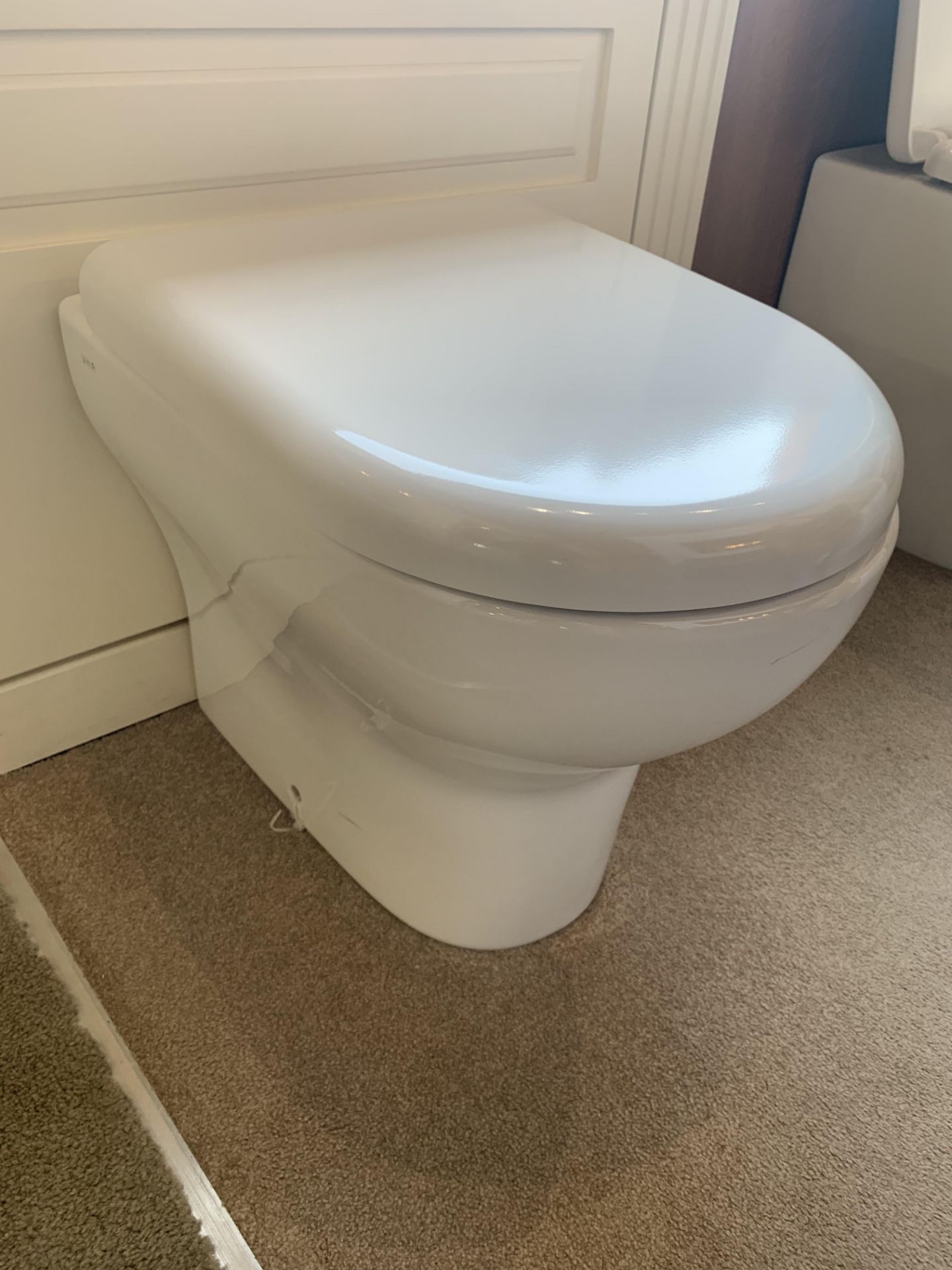 Vitra floor to wall wc with soft close seat