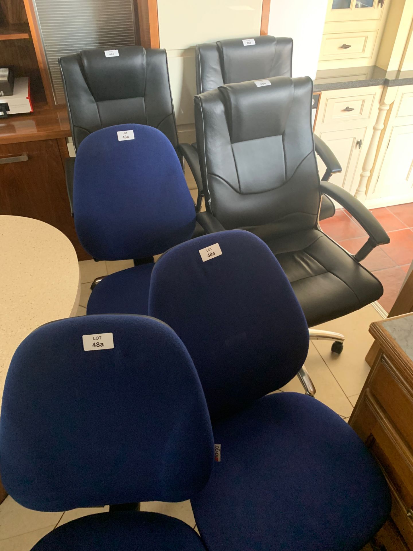 3 x Leather style and chrome director's chairs and 3 x blue upholstered typists chairs