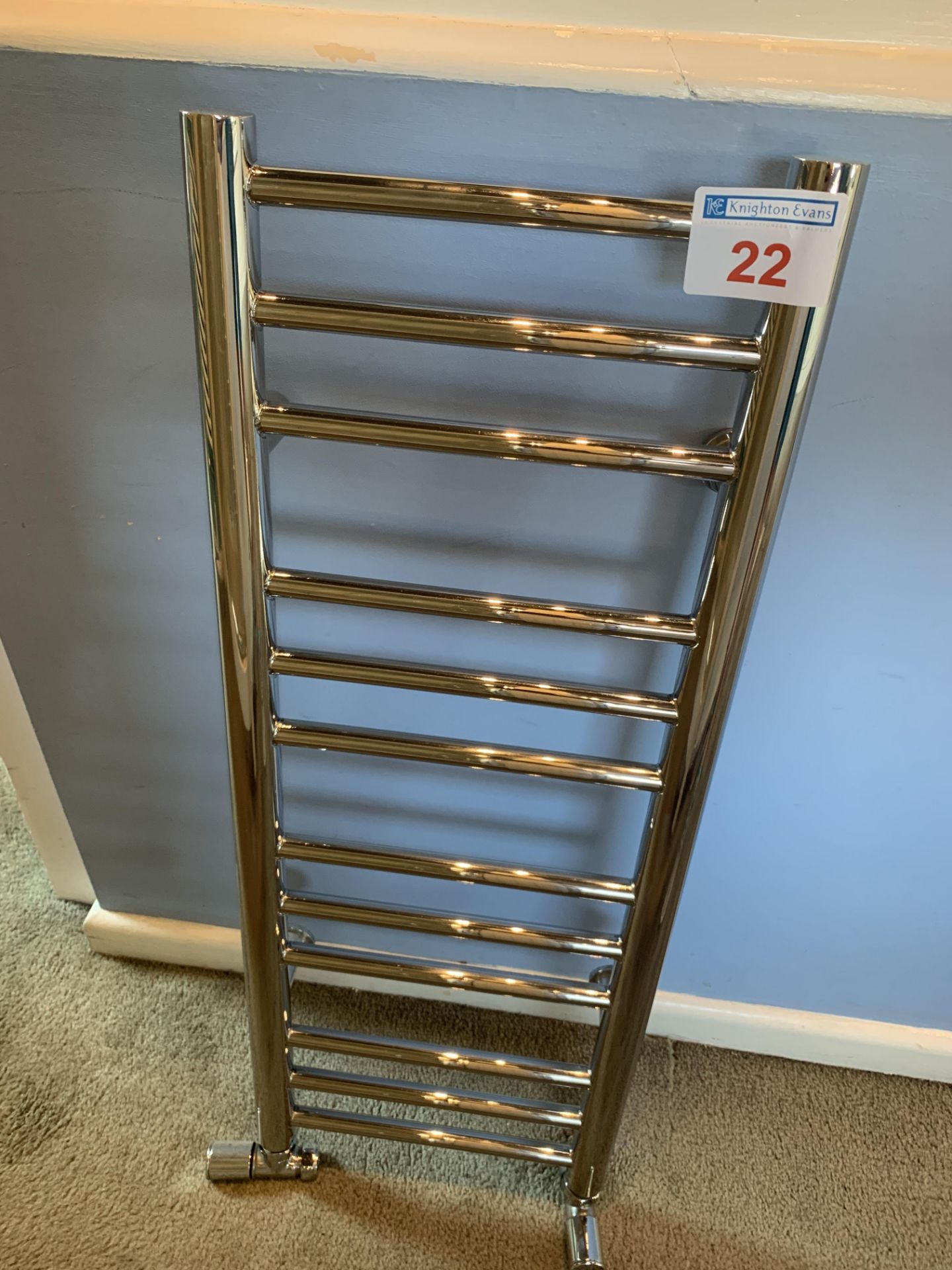 Small chrome towel radiator, towel holder and toilet roll holder