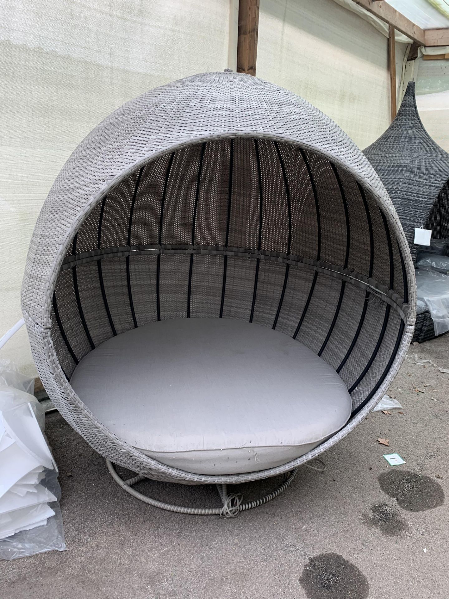 An oval outdoor lounger - some damage as shown in photos