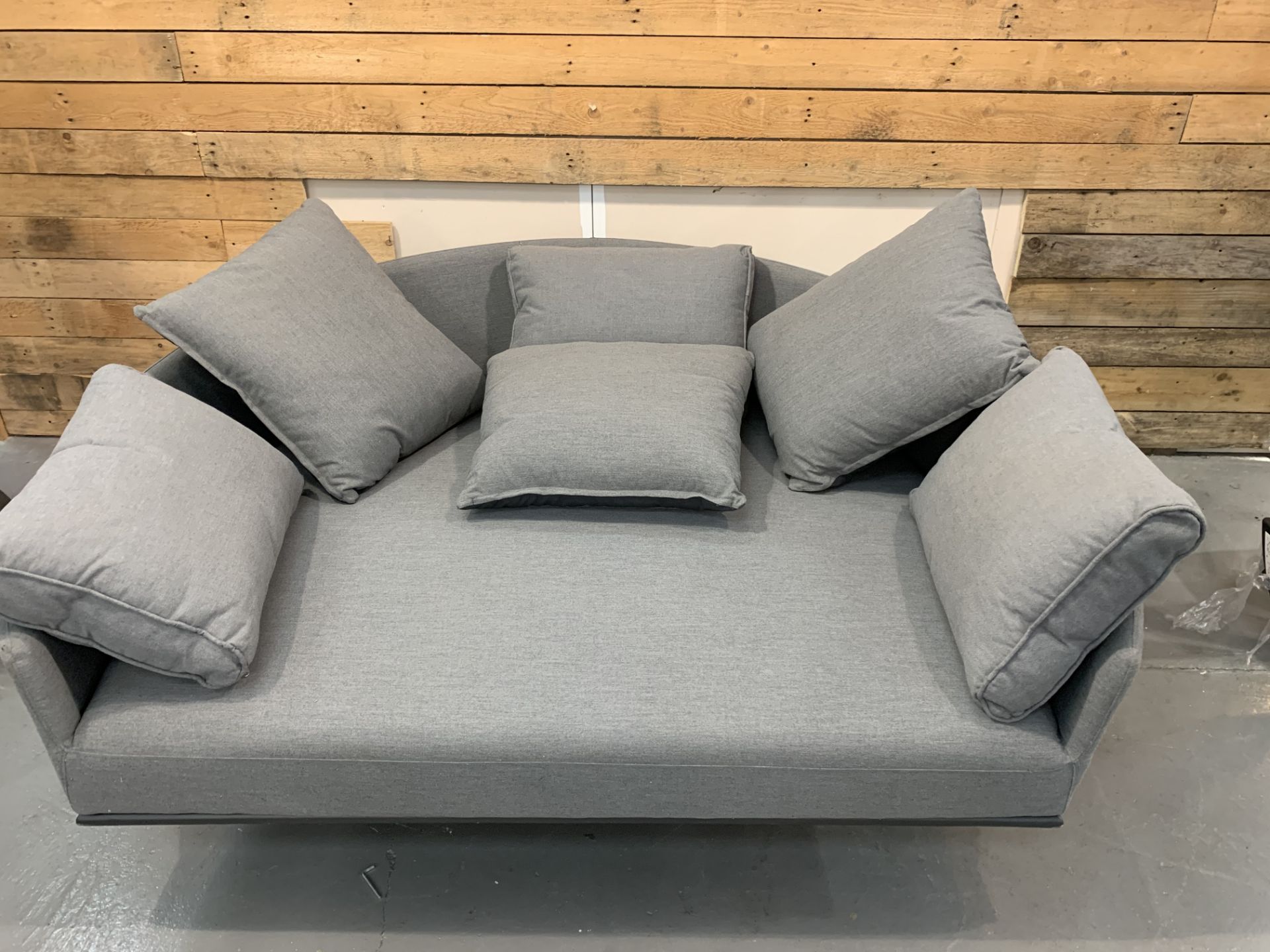 Grey Maze Rattan Lounger with cushions, unfortunately lacking 3 legs