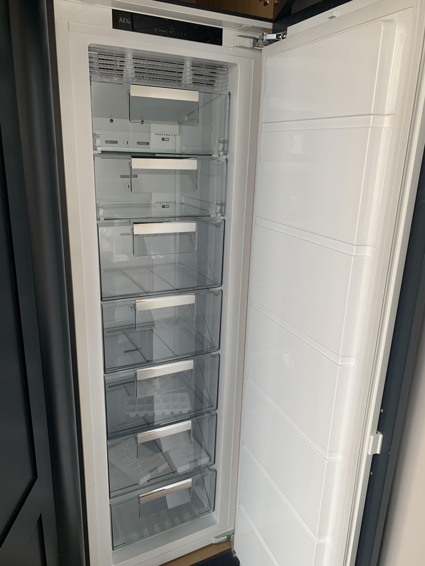 Shaker kitchen pantry with fridge and freezer, sink cabinets below and above with boiler tap - Image 7 of 18