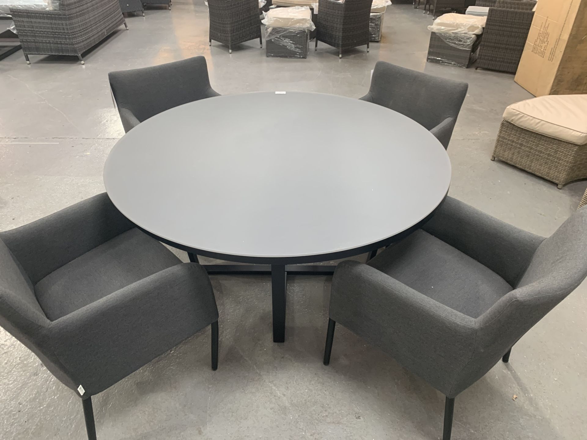 Maze Lounge Sunbrella Grey dining table with 4 matching tub chairs