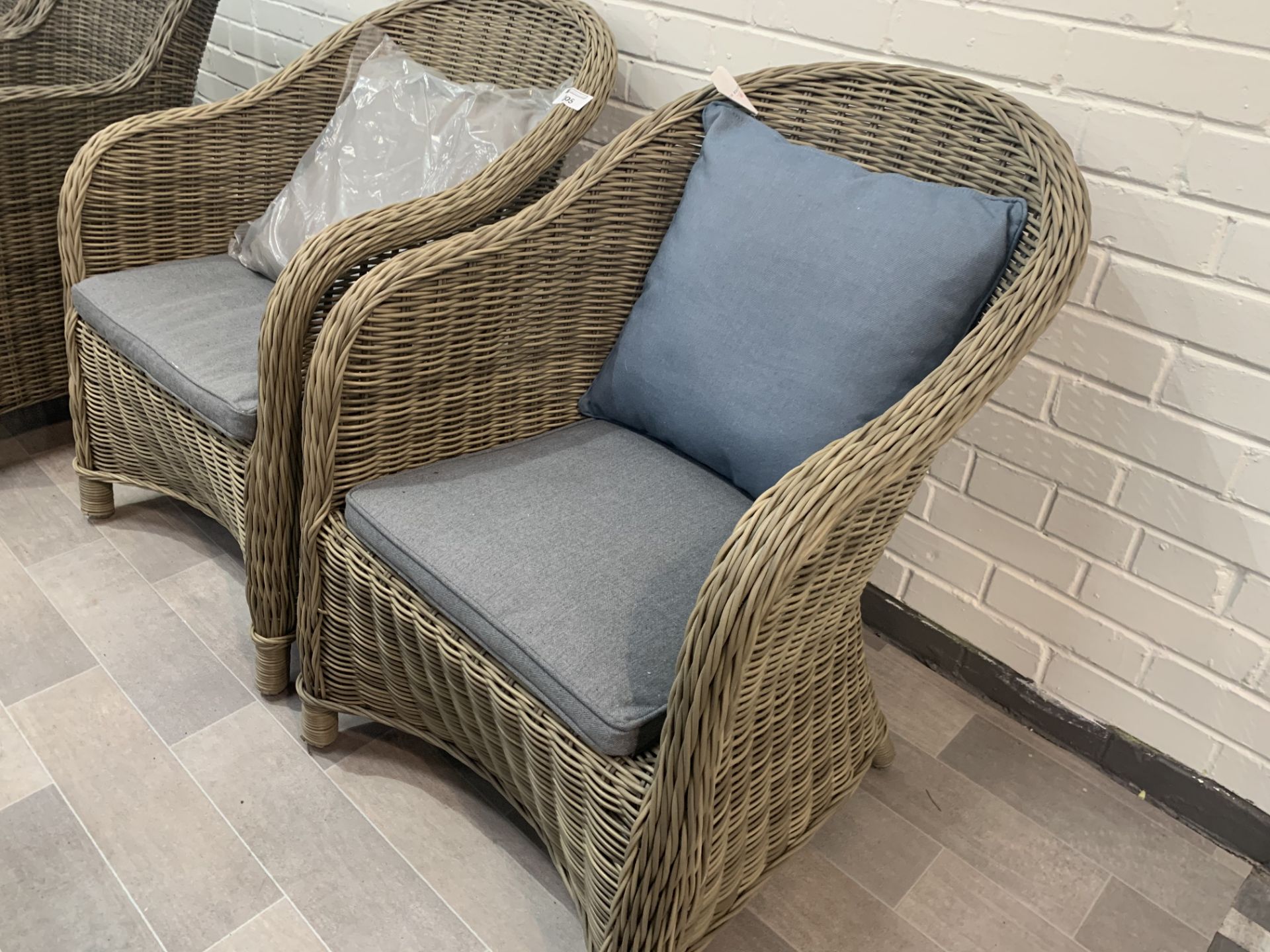 A Pair of Maze Rattan curved back woven arm chairs with cushions - Image 3 of 3
