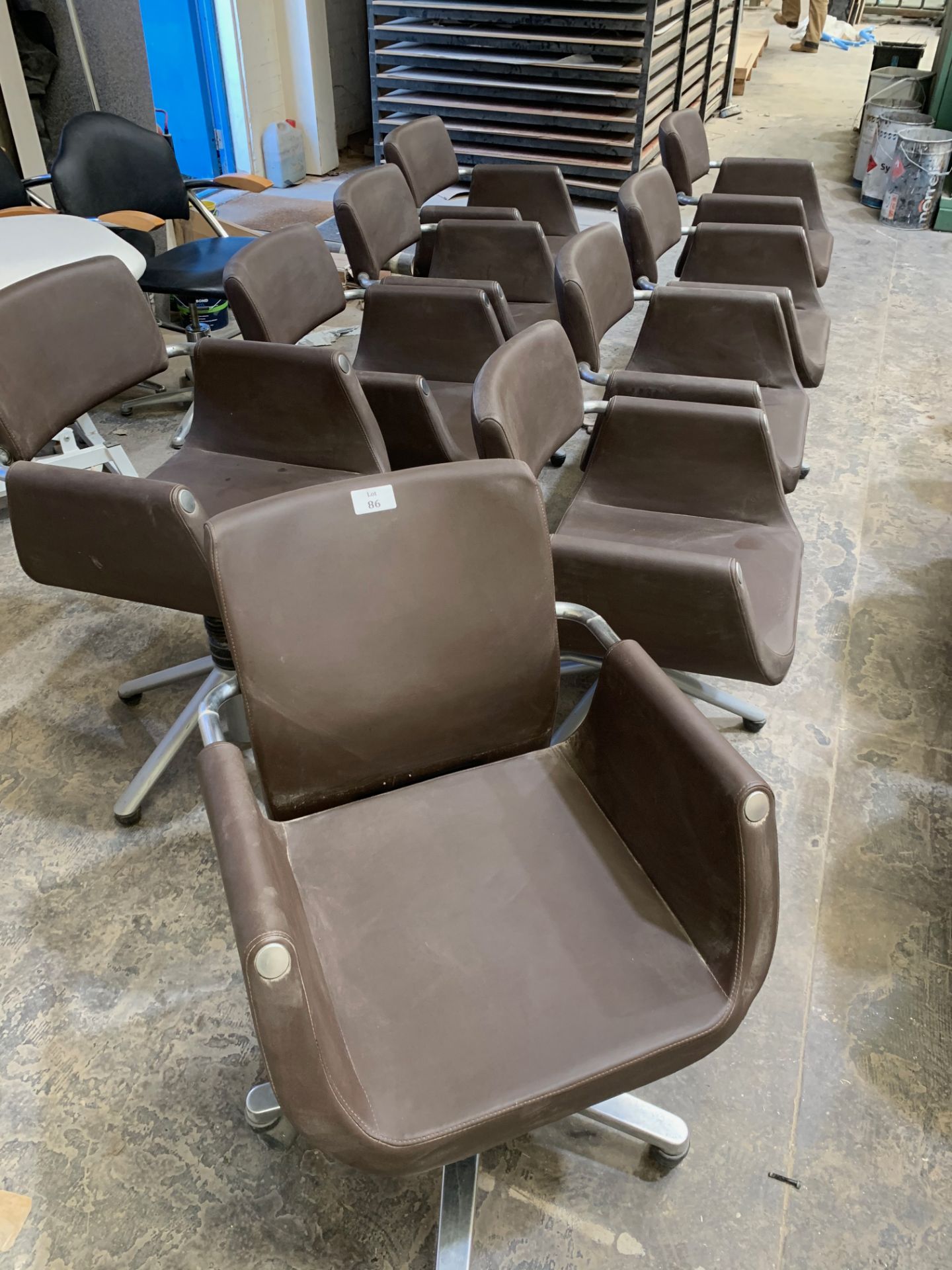 9 x Brown rise, fall and recline salon arm chairs