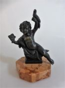 Bronzeputto, 1.H.20.Jh., Putto mit Vogel und Weintrauben haltend, auf Steinsockel, h.