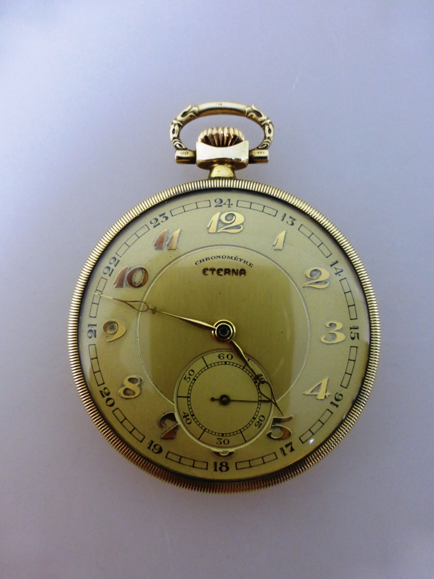 Goldene Frackuhr, Eterna Watch Co., mit Ornamenten verziertes Goldgehäuse, Feingehalt 585,