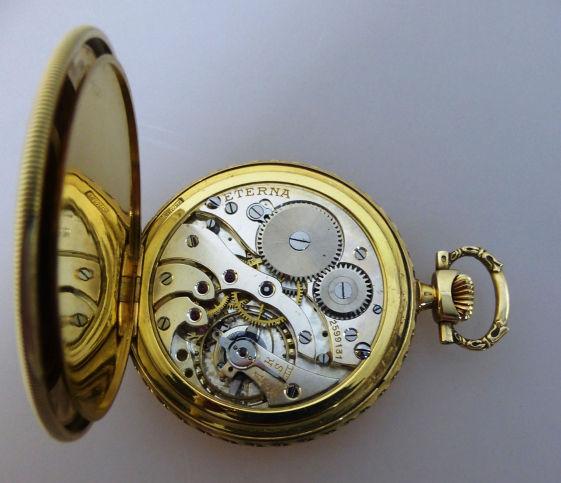 Goldene Frackuhr, Eterna Watch Co., mit Ornamenten verziertes Goldgehäuse, Feingehalt 585, - Image 3 of 3