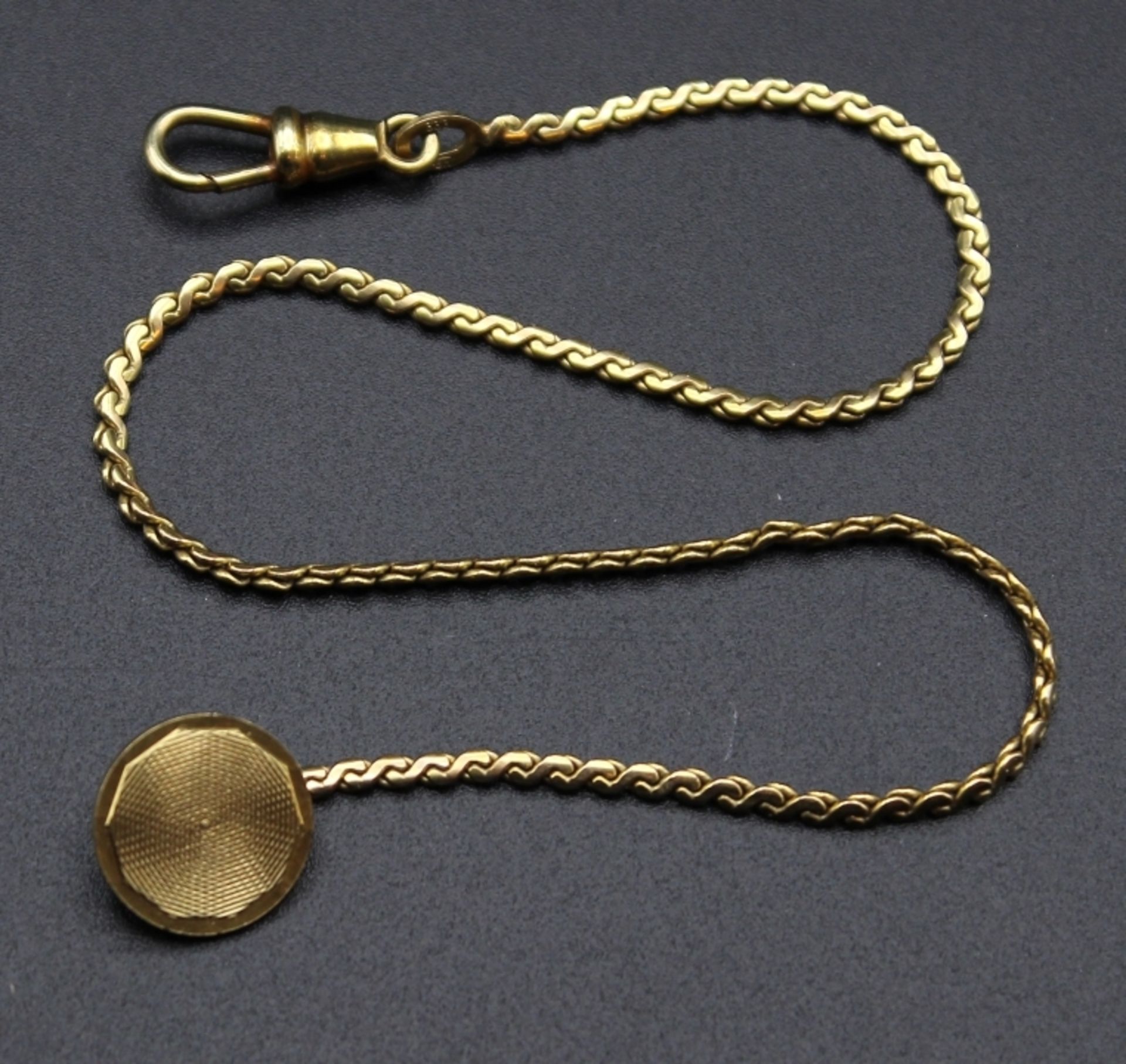 Goldene Uhrenkette - Gelbgold gest. 333 Zopfmusterglieder, Knopfplatte und Karabiner, Länge ca. 25,5