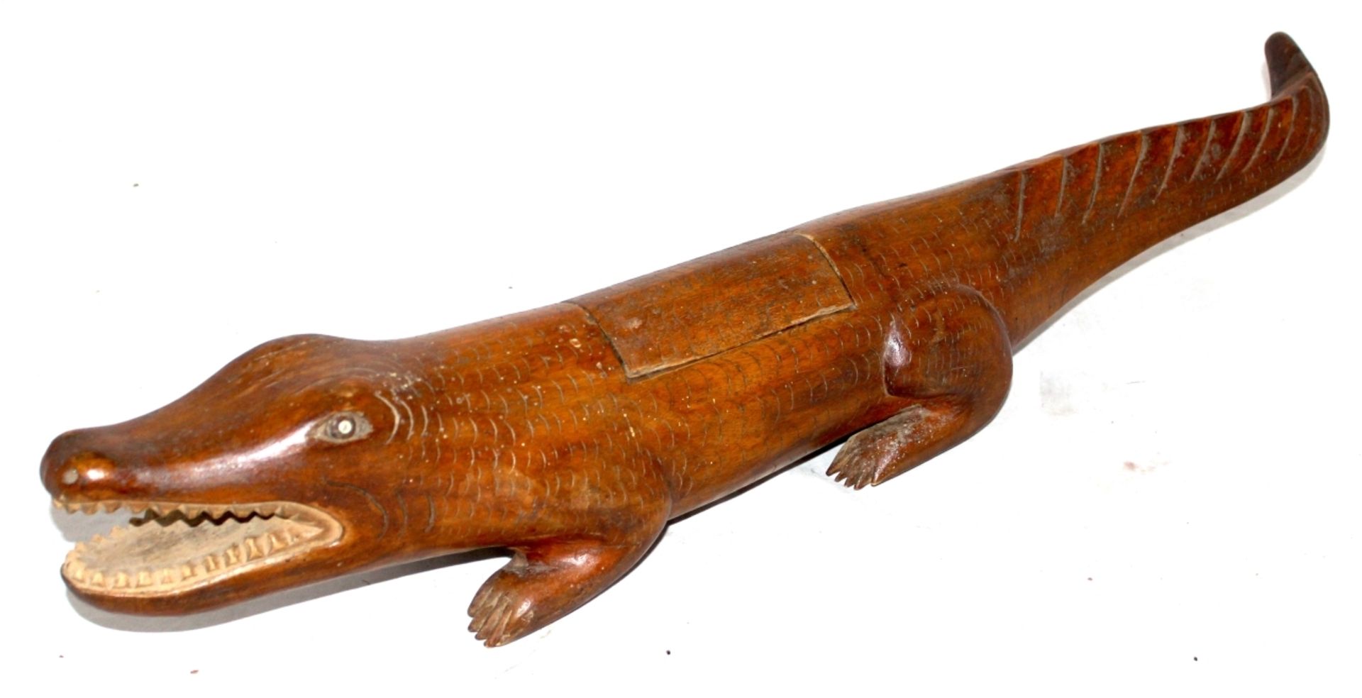 Figur - wohl Südostasien "Krokodil", Holz geschnitzt, Rücken mit Fach, Länge ca. 71 cm