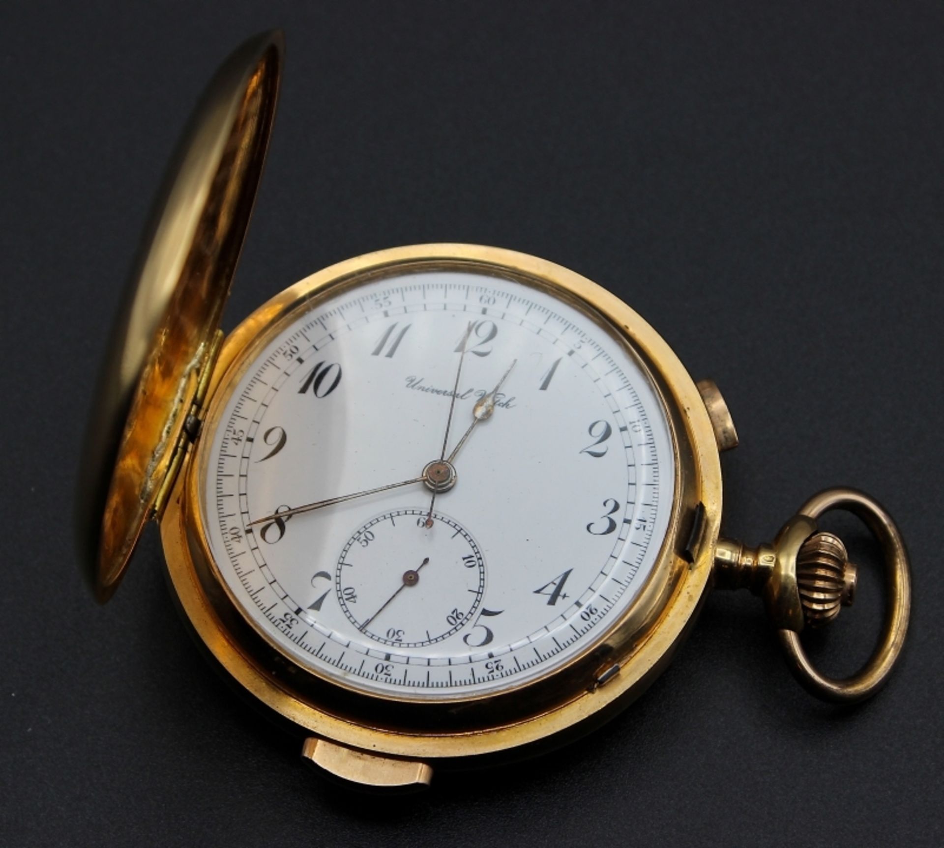 Schwere goldene Sprungdeckel-Taschenuhr - Marke Universal Watch Chronographe mit Minuten-Rep.,