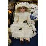 Armand Marseille doll, porcelain head with brown g