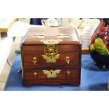 A Chinese hardwood toilet chest, fitted with white